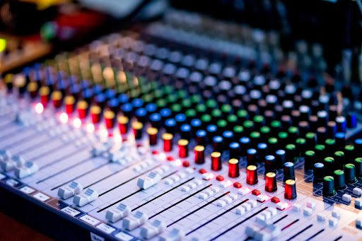 Professional mixing soundboard to demonstrate a/v system design