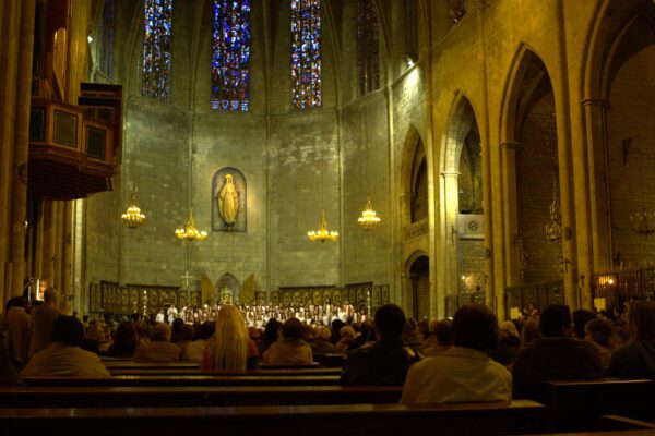 View of a choir and speakers from a church sound booth